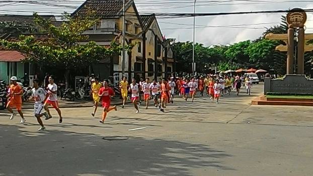 Participating in a running race